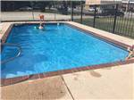 View larger image of View of the swimming pool at COVERED WAGON RV RESORT image #3