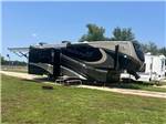 A fifth-wheel trailer parked at site - thumbnail