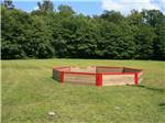 A ball pit court in the grass at PIONEER CAMPGROUND - thumbnail