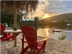 View larger image of A couple of chairs overlooking the water at SID TURCOTTE PARK CAMPING AND COTTAGE RESORT image #2