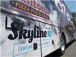 View larger image of A motorhome with the campground logo at SKYLINE RV RESORT image #5