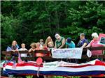 View larger image of A group of people on a float at TAMWORTH CAMPING AREA image #2