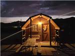 Rental cabin at night at Black Canyon Campground - thumbnail