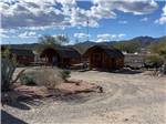 Rental cabins on a gravel road at Black Canyon Campground - thumbnail