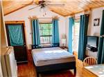 View larger image of The bedroom area in one of the rental cottages at BEACON HILL CAMPING image #4
