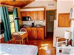 View larger image of The kitchen area in one of the rental cottages at BEACON HILL CAMPING image #5