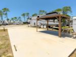 Open RV space with covered panic area at Sun Retreats Estero Bay - thumbnail