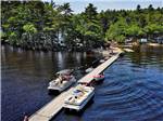 View larger image of Boats docked in the lake at LAKE PEMAQUID CAMPGROUND image #10