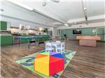 Kitchen and indoor recreation room - thumbnail