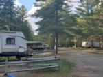 Parked trailers at site Spacious Skies Adirondack Peaks - thumbnail