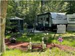 One of the RV sites under trees at TIDEWATER CAMPGROUND - thumbnail