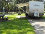 View larger image of A travel trailer in a paved RV site at ALLATOONA LANDING MARINE RESORT image #2