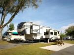 Parked RV at site Sun Retreats Orlando ChampionsGate - thumbnail