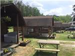 Rental cabin with table in front at Atlanta South RV Resort - thumbnail