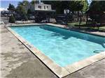 The swimming pool area at MOUNTAIN SHADOWS RV PARK & MHP - thumbnail