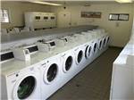 View larger image of Laundry room with washer and dryers at PISMO COAST VILLAGE RV RESORT image #4