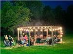 A group in a lighted seating area - thumbnail