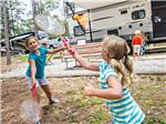 View larger image of Two girls playing badminton at STONE MOUNTAIN PARK CAMPGROUND image #6