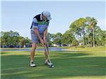 View larger image of Man golfing at FORT MYERS BEACH RV RESORT image #5