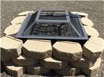 View larger image of A fire pit surrounded by gravel at OVERNITE RV PARK image #11