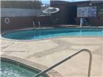 Hot tub by the pool - thumbnail