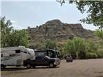 RVs parked in gravel sites at RED TRAIL CAMPGROUND - thumbnail