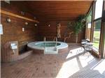 View larger image of The covered outdoor hot tub at CAPILANO RIVER RV PARK image #5