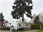 A travel trailer in a back in RV site at CAPILANO RIVER RV PARK - thumbnail