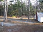 Gravel RV pads at Whispering Surf Campground At Bass Lake - thumbnail