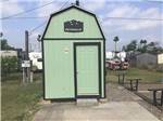View larger image of A small green building next to the bocceball courts at MCALLEN MOBILE PARK image #3