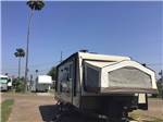 View larger image of A pop up trailer in an RV site at MCALLEN MOBILE PARK image #5
