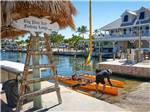 A man with an outrigger on a boat ramp at campground at BIG PINE KEY RESORT - thumbnail