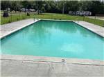 The fenced in swimming pool at Vinton RV Park - thumbnail