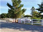 The white fence by the propane filling station at ROADRUNNER RV PARK OF DEMING - thumbnail