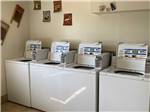 A line of washing machines at ROADRUNNER RV PARK OF DEMING - thumbnail