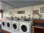 Four washing machines in the laundry room at Port Orford RV Village - thumbnail