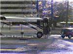 A motorhome parked in a RV site at MORRILTON I40/107 RV PARK - thumbnail