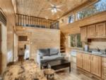 View of living area in a cabin at GLENWOOD CANYON RESORT - thumbnail