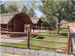 Rental cabins with picnic benches at CEDAR CITY RV RESORT BY RJOURNEY - thumbnail