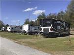 View larger image of A row of grassy RV sites at PERRY PONDEROSA PARK image #8