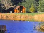 Cabin in front of lake at Cloverdale/Healdsburg Campground - thumbnail