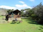 Cabin in front of panic table at Cloverdale/Healdsburg Campground - thumbnail