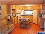 View larger image of The kitchen area of the cabin at BARABOO RV RESORT image #11