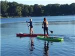 A couple of women on standing paddle boards at FULLER'S RESORT & CAMPGROUND ON CLEAR LAKE - thumbnail