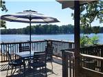 A seating area overlooking the water at FULLER'S RESORT & CAMPGROUND ON CLEAR LAKE - thumbnail