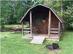A rental cabin with a front porch - thumbnail