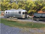 View larger image of An Airstream in a gravel RV site at CALHOUN AOK CAMPGROUND image #8