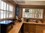 Coffee bar and microwave area at LARAMIE RV RESORT BY RJOURNEY - thumbnail