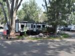 A large fifth whell with slide outs at site at YELLOWSTONE RIVER RV PARK & CAMPGROUND - thumbnail