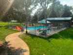 The enclosed pool area at YELLOWSTONE RIVER RV PARK & CAMPGROUND - thumbnail